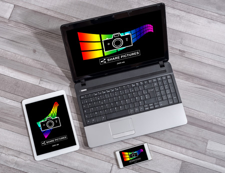 Pictures sharing concept shown on different information technology devicesの写真素材