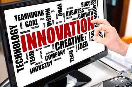 Innovation word cloud concept shown on a computer screenの写真素材