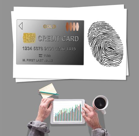 Male hands using tablet in front of payment security conceptの写真素材