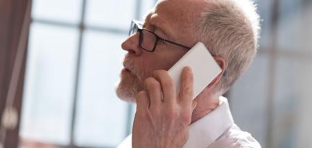 Senior man talking on mobile phone
