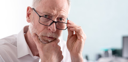 Portrait of thoughtful senior businessman