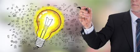 Businessman drawing an ideas conceptの写真素材