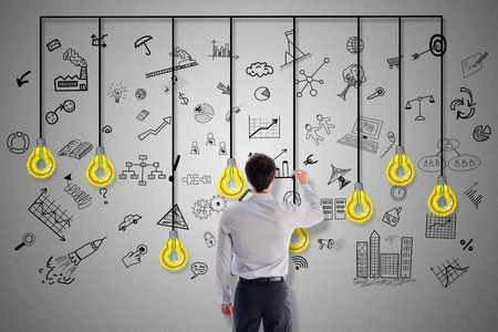 Creativity concept drawn by a businessmanの写真素材