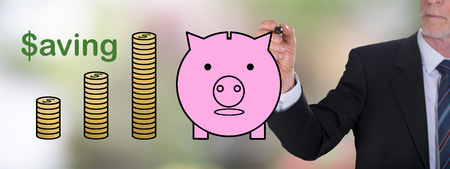Businessman drawing a saving conceptの写真素材