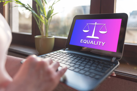 Laptop screen displaying an equality concept