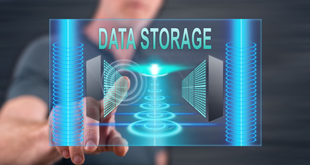 Man touching a data storage concept on a touch screen with his finger