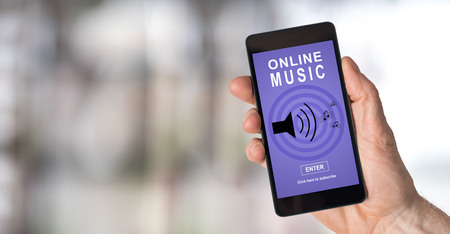 Smartphone screen displaying an online music conceptの写真素材
