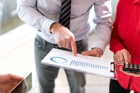Business people in meeting discussing about financial results in office