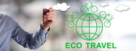 Man drawing an eco travel conceptの写真素材