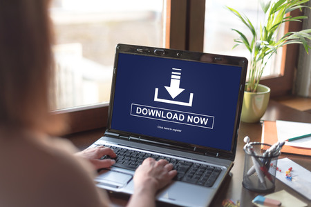 Laptop screen displaying a download conceptの写真素材