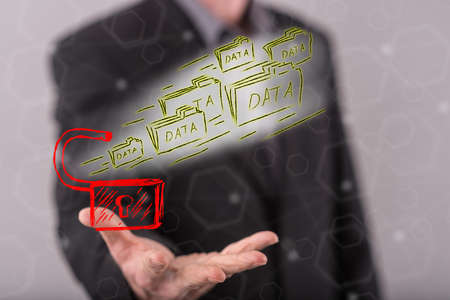 Data loss concept above the hand of a man in backgroundの写真素材
