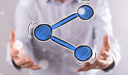 Share concept above the hands of a man in backgroundの写真素材