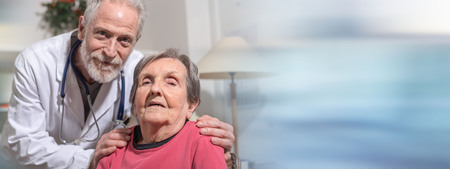 Doctor comforting senior womanの写真素材