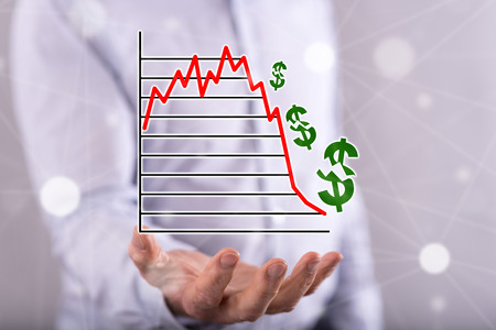 Stock market crash concept above the hand of a man in background