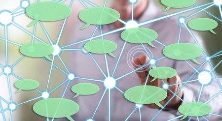 Man touching a social network concept on a touch screen with his fingerの写真素材