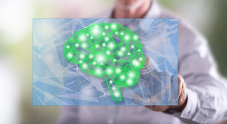 Man touching an intelligence concept on a touch screen with his fingerの写真素材