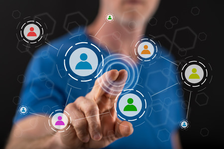 Man touching a social media network on a touch screen with his fingerの写真素材