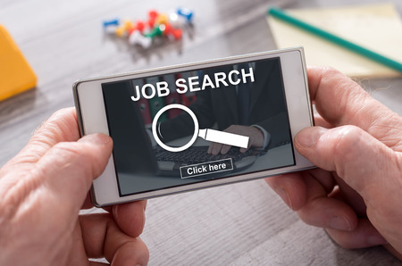 Job search concept on mobile phoneの写真素材
