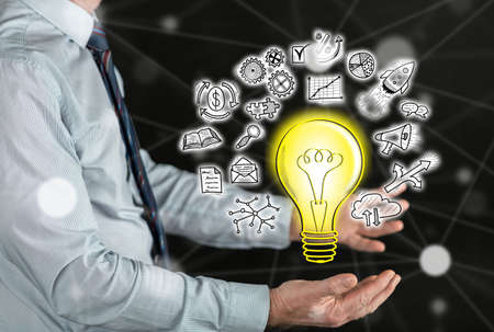 Innovative idea concept above the hands of a man