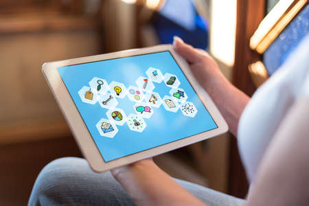 Woman holding a tablet showing business strategy concept