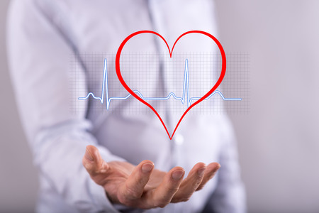 Medicine concept above the hand of a man in backgroundの写真素材