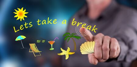 Man touching vacation time on a touch screen with his fingerの写真素材