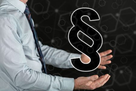 Law concept above the hands of a manの写真素材