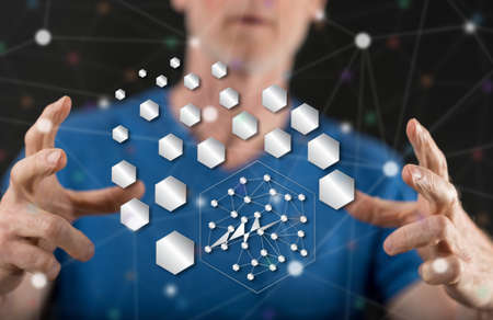 Abstract network concept between hands of a man in backgroundの写真素材