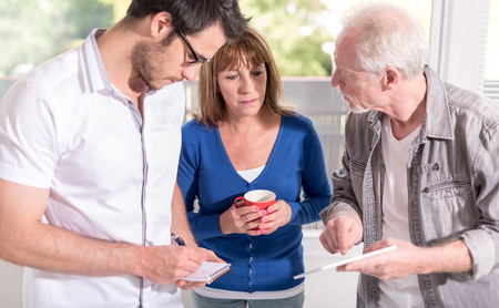 Coworkers having a business discussion in officeの写真素材
