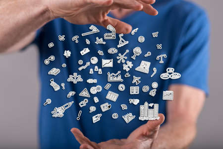 Business concept between hands of a man in backgroundの写真素材