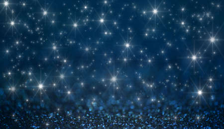 Abstract Merry Christmas card with stars and bright blue spanglesの写真素材