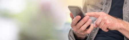 Man using mobil phone, light effect
