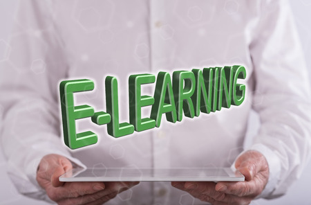 E-learning concept above a tablet held by a man in background