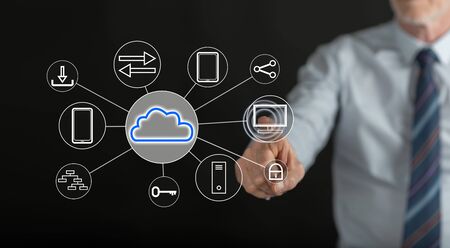 Man touching a cloud computing concept on a touch screen with his finger