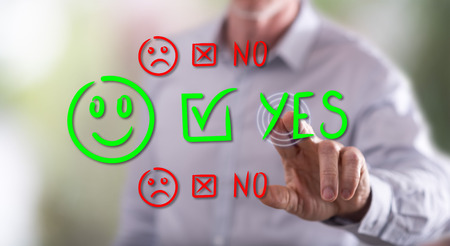 Man touching an evaluation concept on a touch screen with his fingerの写真素材