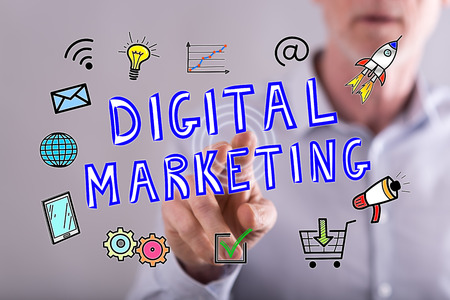 Man touching a digital marketing concept on a touch screen with his fingerの写真素材
