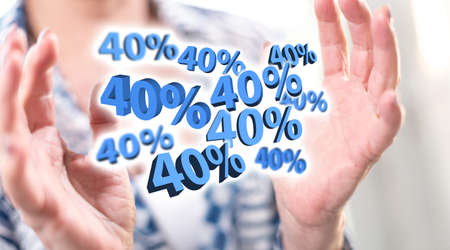 40 % discount concept between hands of a woman in backgroundの写真素材