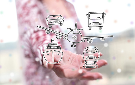 Transportation concept above the hand of a woman in backgroundの写真素材