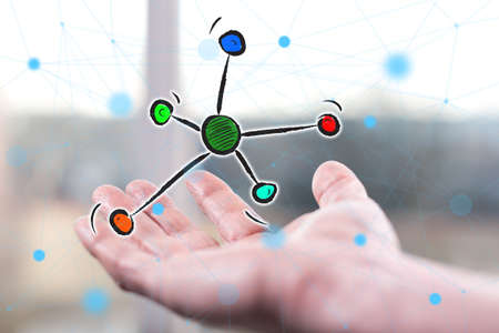 Network concept above a hand of a manの写真素材