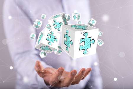 Business partnership concept above the hand of a man in background