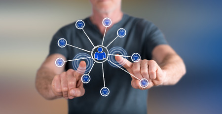 Man touching a social network concept on a touch screen with his fingersの写真素材