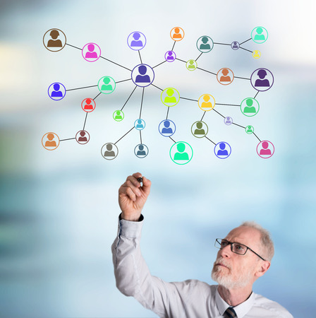 Social network concept drawn by a businessmanの写真素材