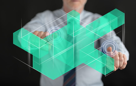 Man touching a blockchain technology concept on a touch screen with his fingersの写真素材