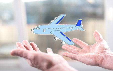 Air transport concept above the hands of a man