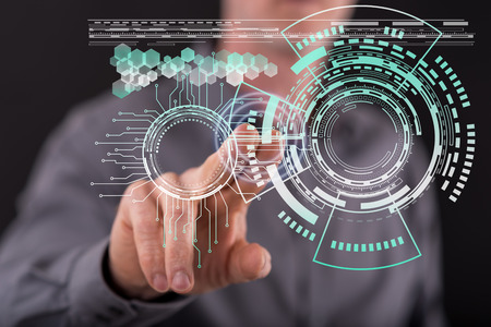 Man touching a technology concept on a touch screen with his finger