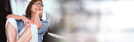 Smiling mature woman at homeの写真素材