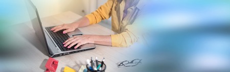 Businesswoman working on laptop in office