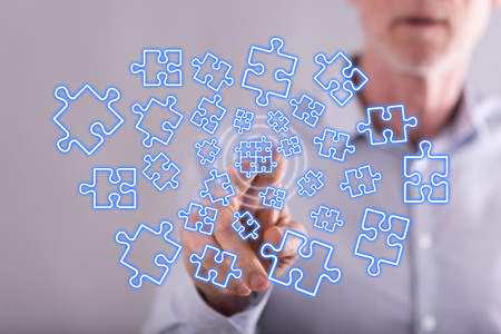 Man touching a teamwork concept on a touch screen with his fingerの写真素材