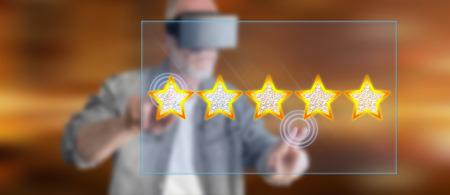Man with vr headset touching a quality concept on a touch screen with his fingers