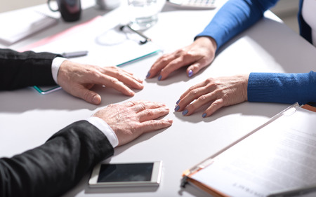 Situation of business negotiation between businesswoman and businessman